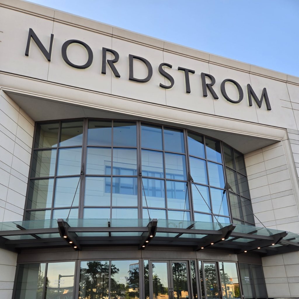 After — Building washing — limestone facade at a retail anchor