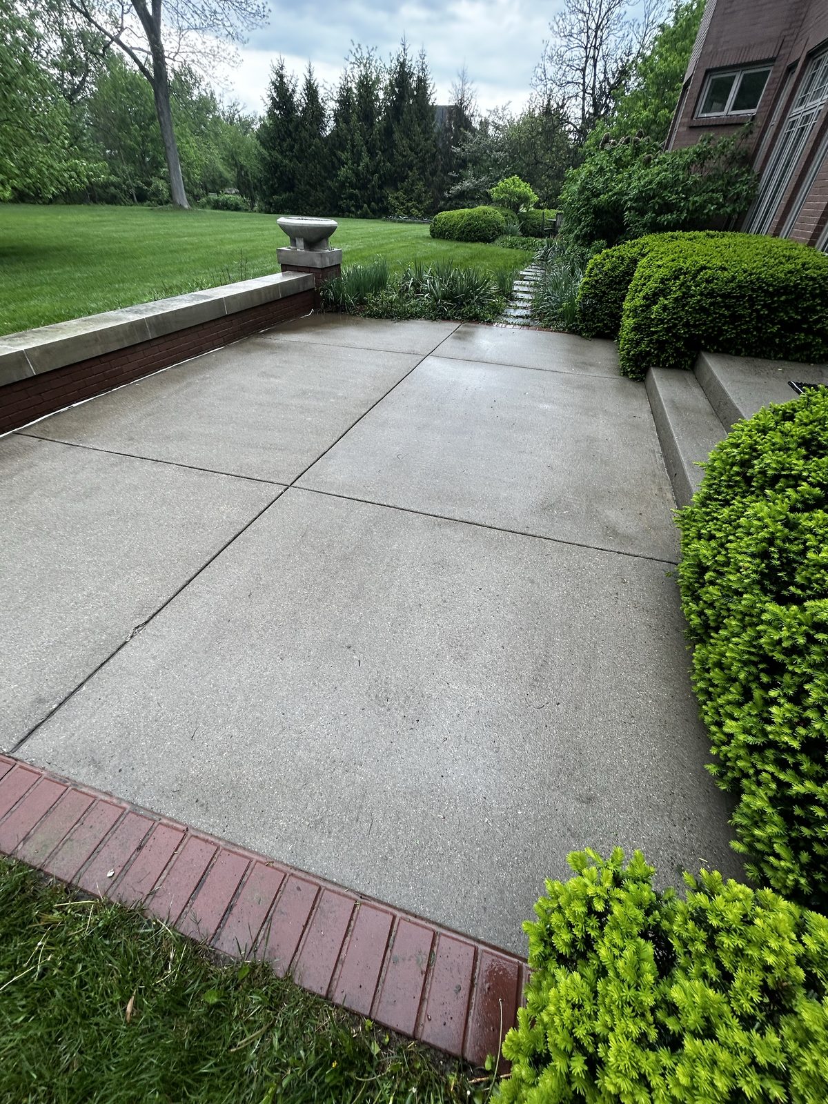 After — Pressure washing — concrete patio and steps