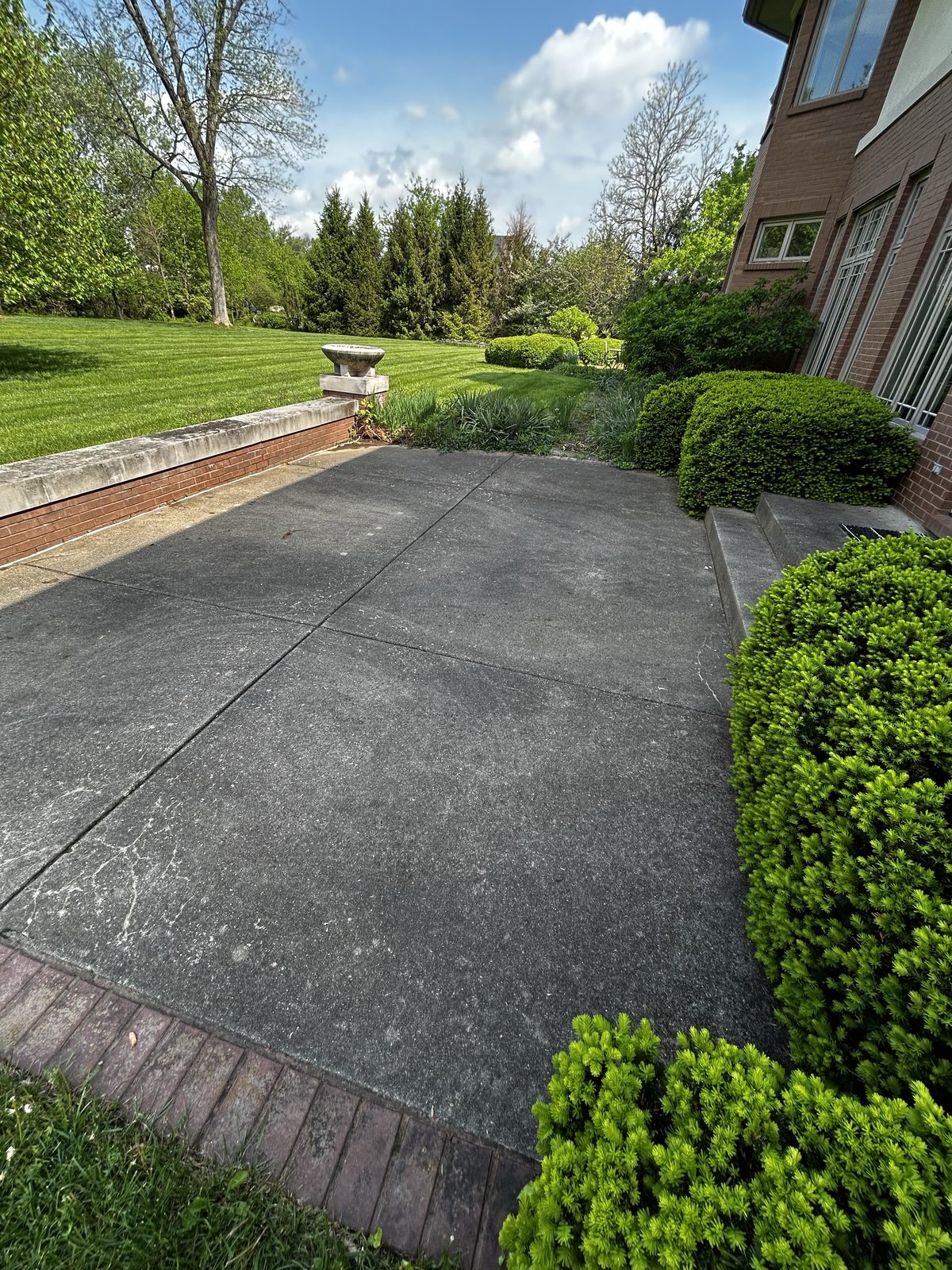 Before — Pressure washing — concrete patio and steps